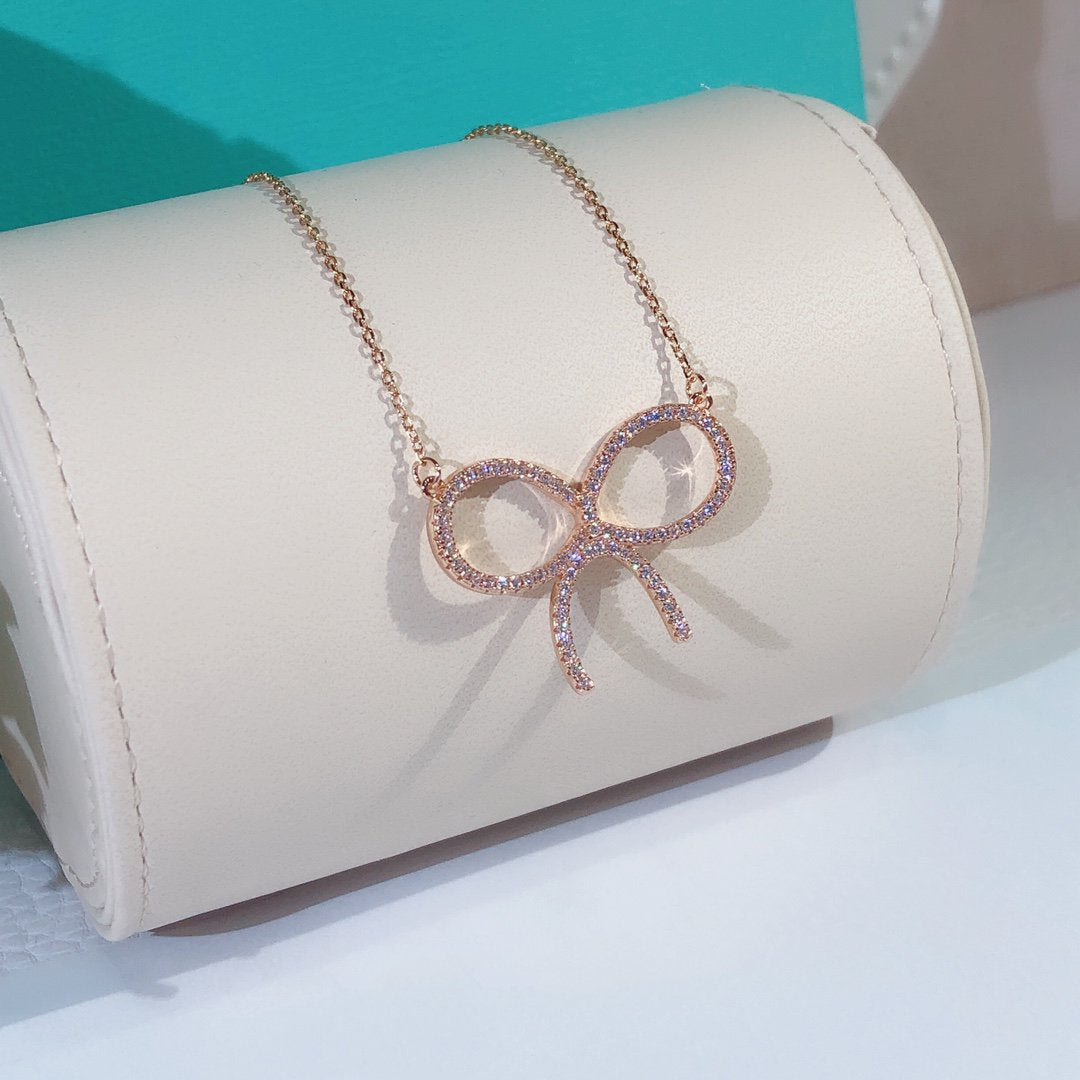 [Hildren Jewelry]CLAW SET RHODIUM PLATED BOW NECKLACE