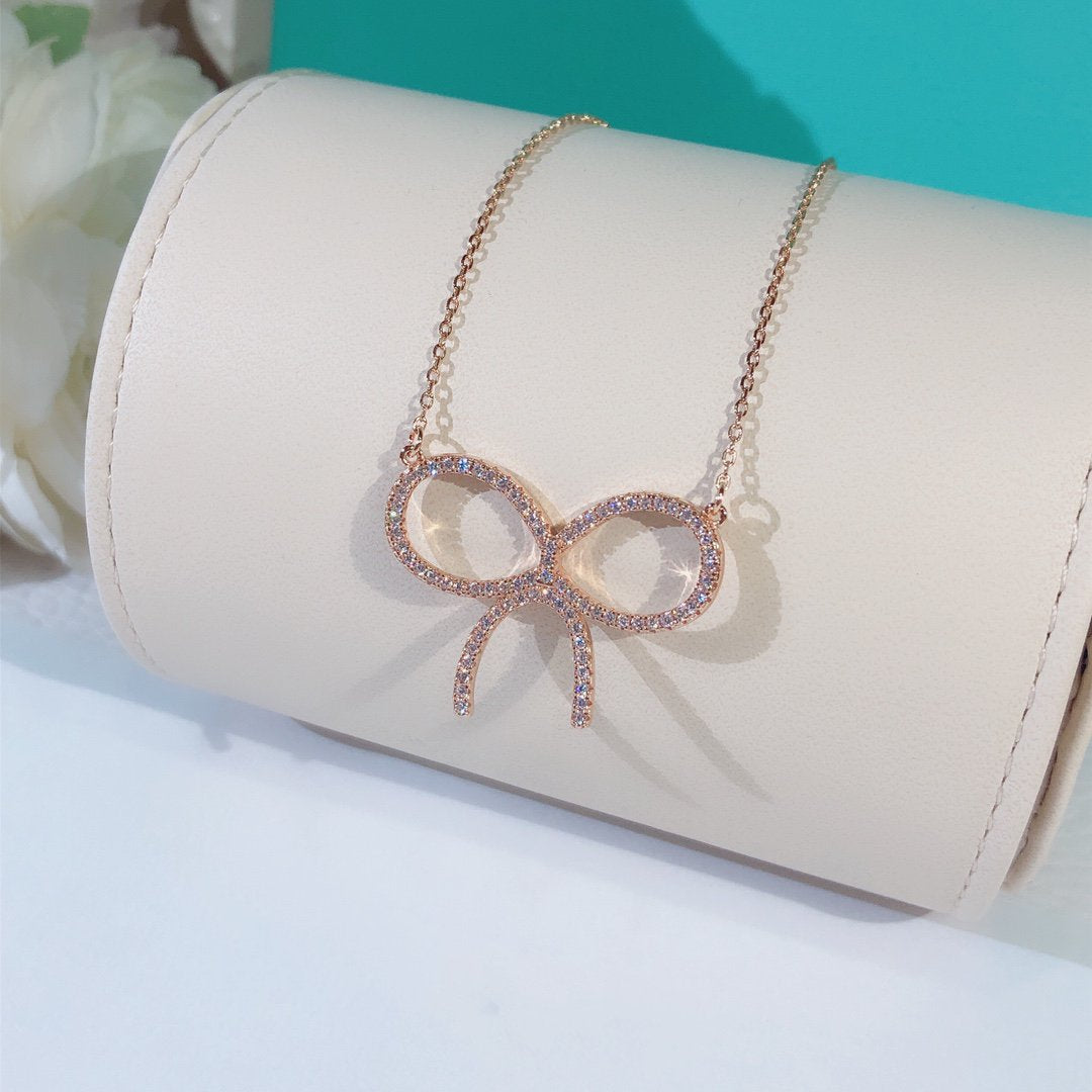 [Hildren Jewelry]CLAW SET RHODIUM PLATED BOW NECKLACE