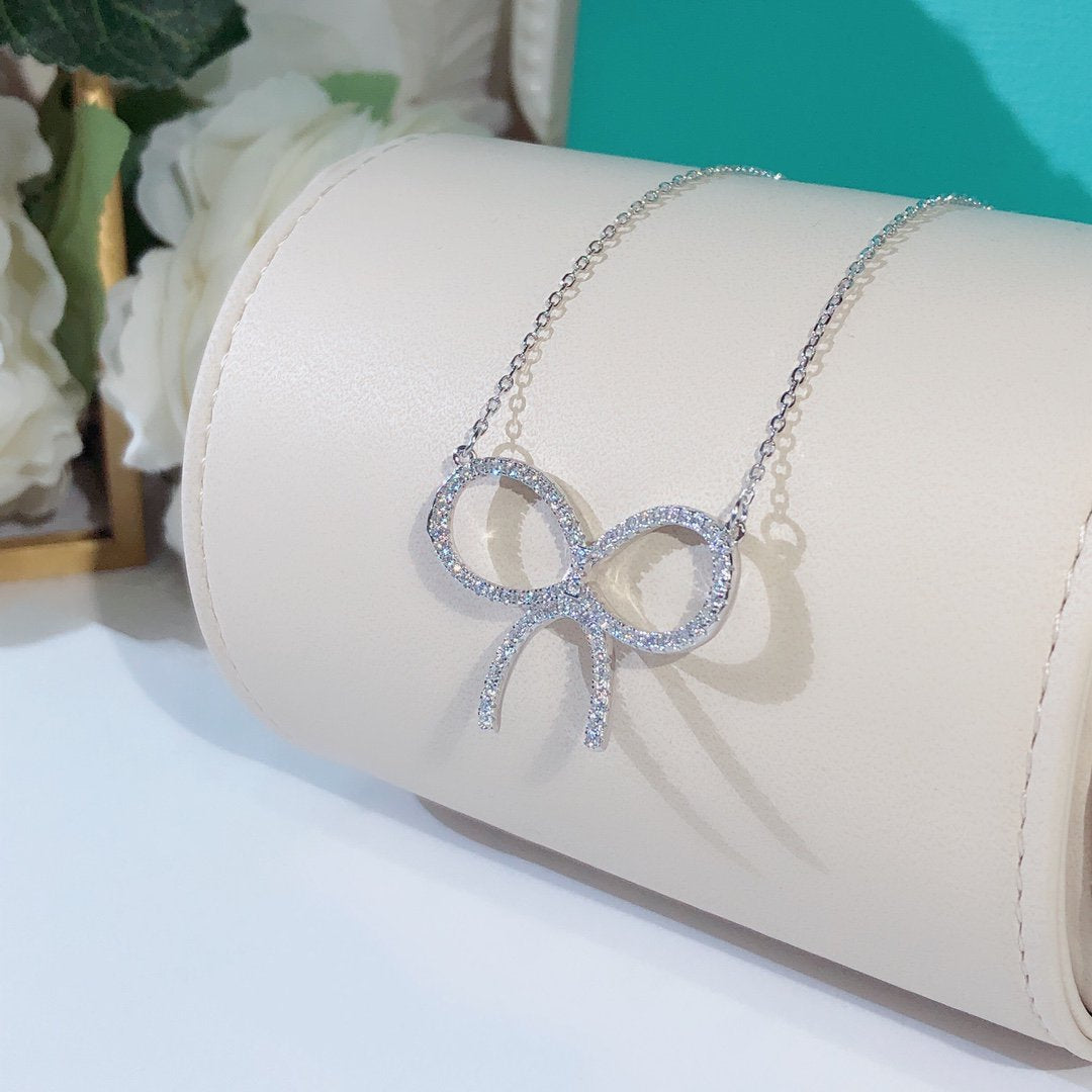 [Hildren Jewelry]CLAW SET RHODIUM PLATED BOW NECKLACE