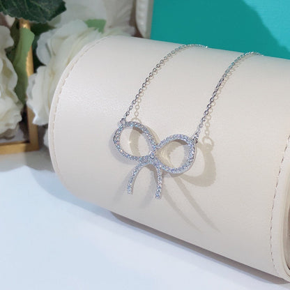 [Hildren Jewelry]CLAW SET RHODIUM PLATED BOW NECKLACE